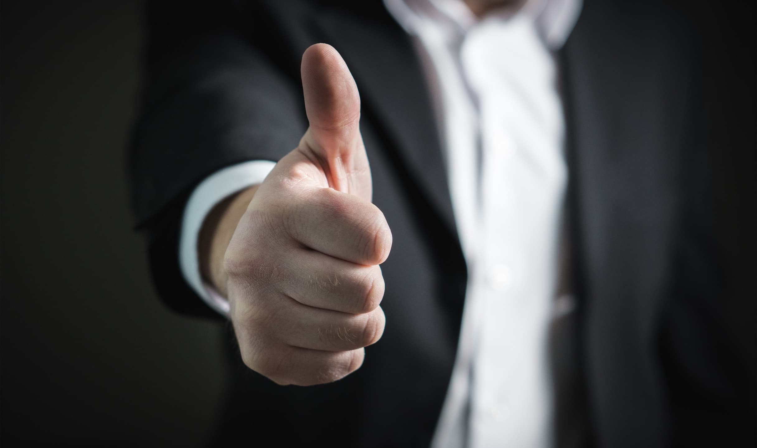 A person showing Thumbs up sign